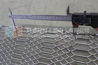 Expanded metal mesh fence